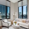 living room with a large window and open spaces